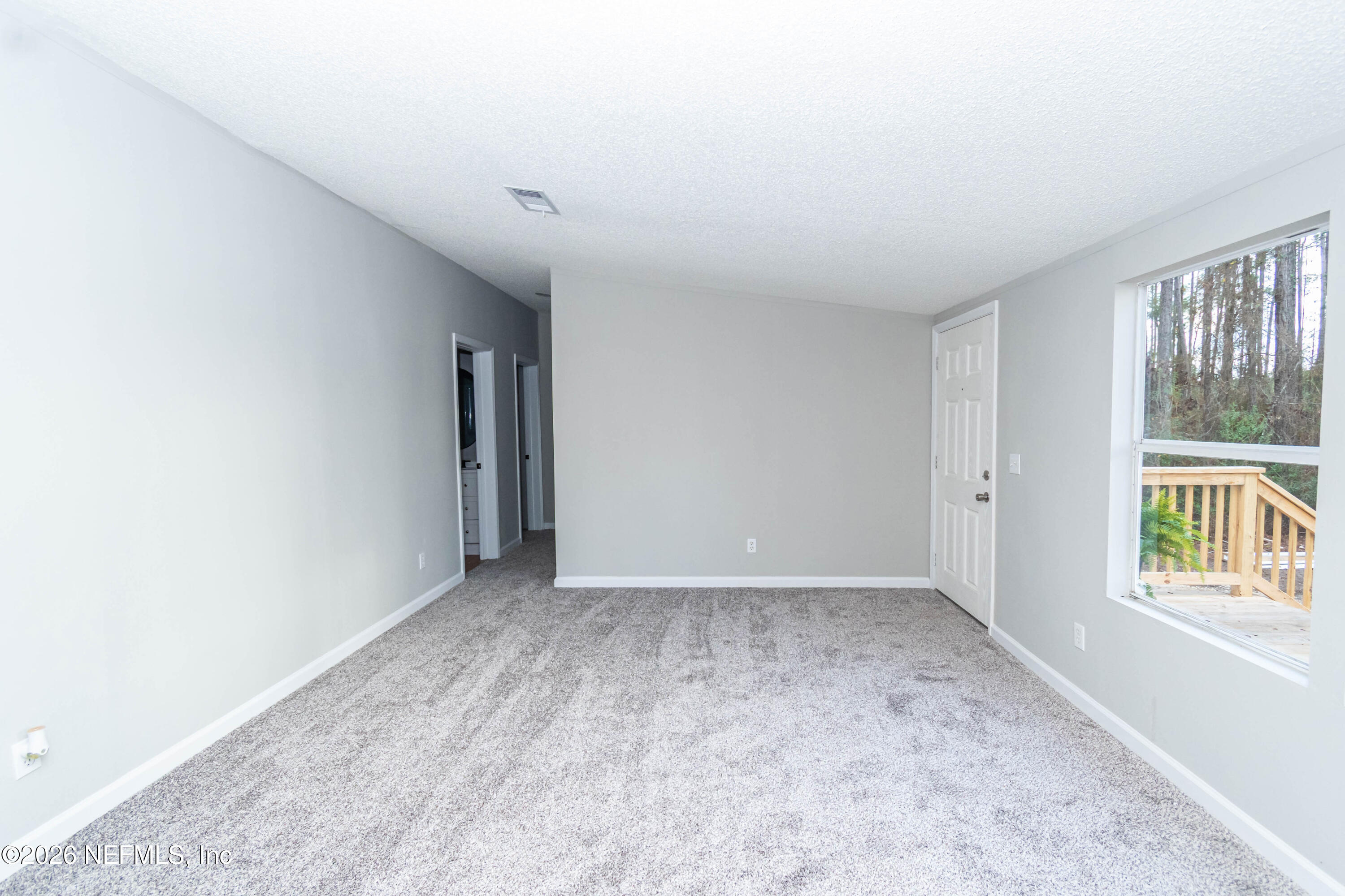 11017 County Road 229 Sanderson, FL 32087 - Photo 15 of 33 an empty room with windows