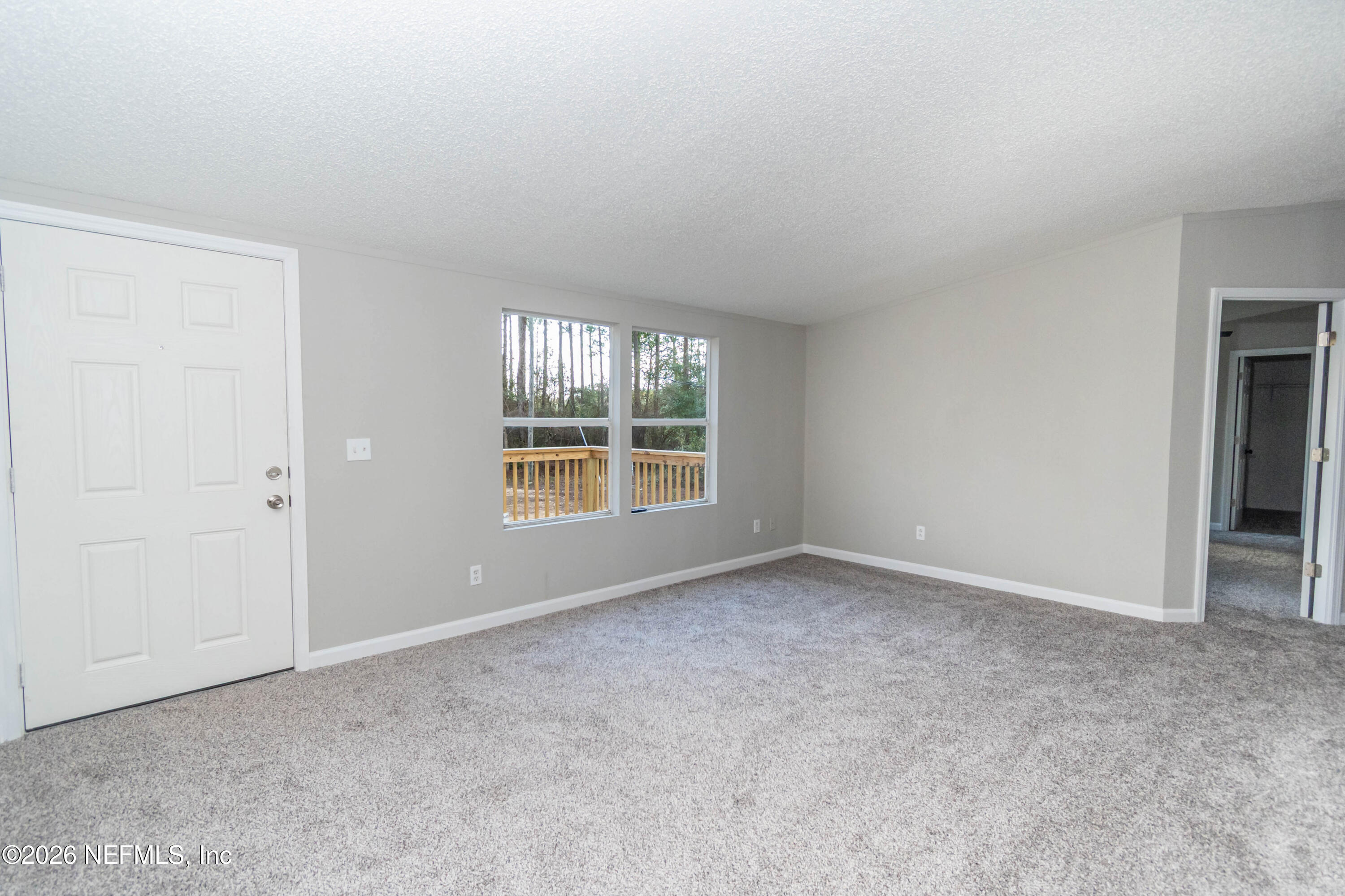 11017 County Road 229 Sanderson, FL 32087 - Photo 17 of 33 an empty room with windows