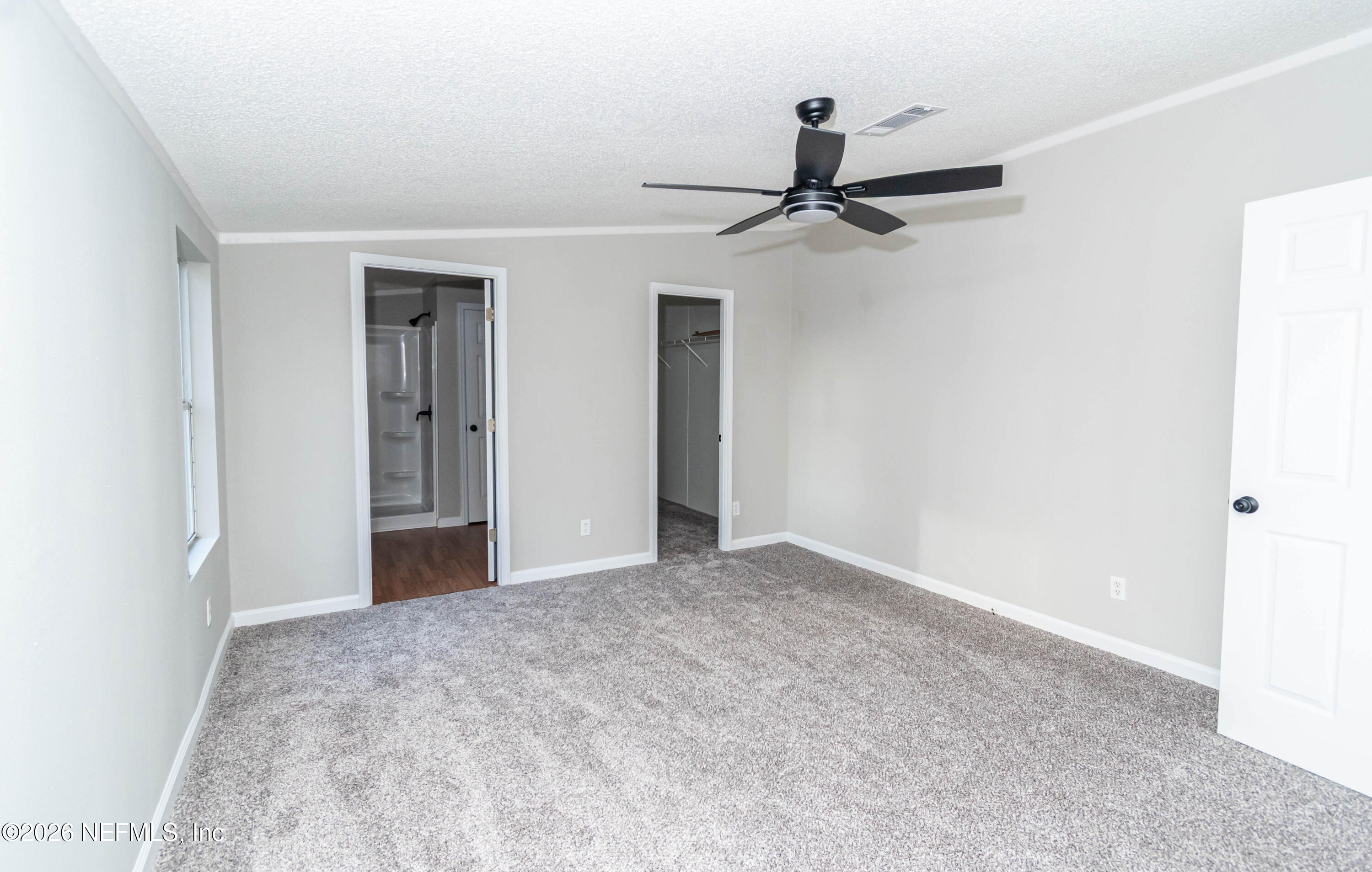 11017 County Road 229 Sanderson, FL 32087 - Photo 18 of 33 a view of empty room with ceiling fan