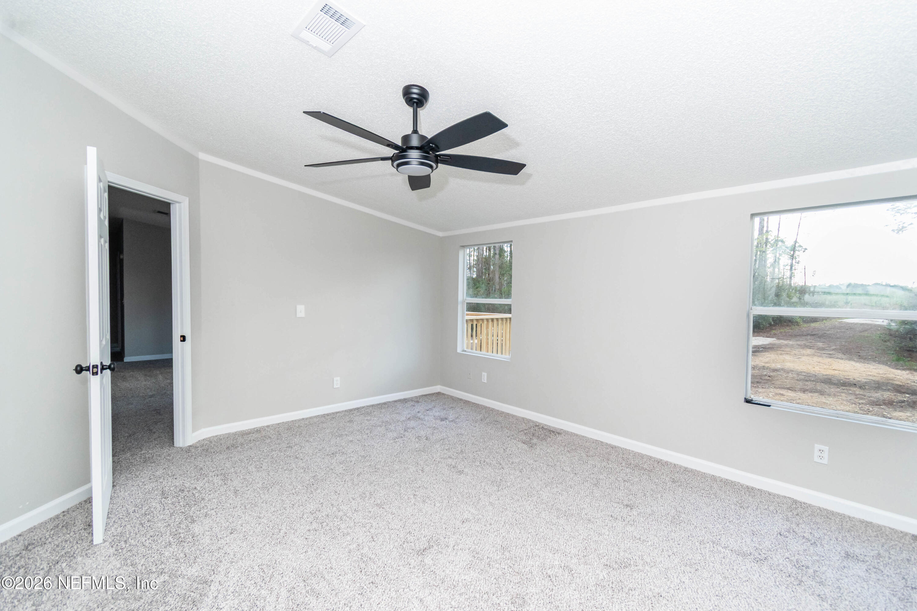 11017 County Road 229 Sanderson, FL 32087 - Photo 19 of 33 a view of an empty room with a window
