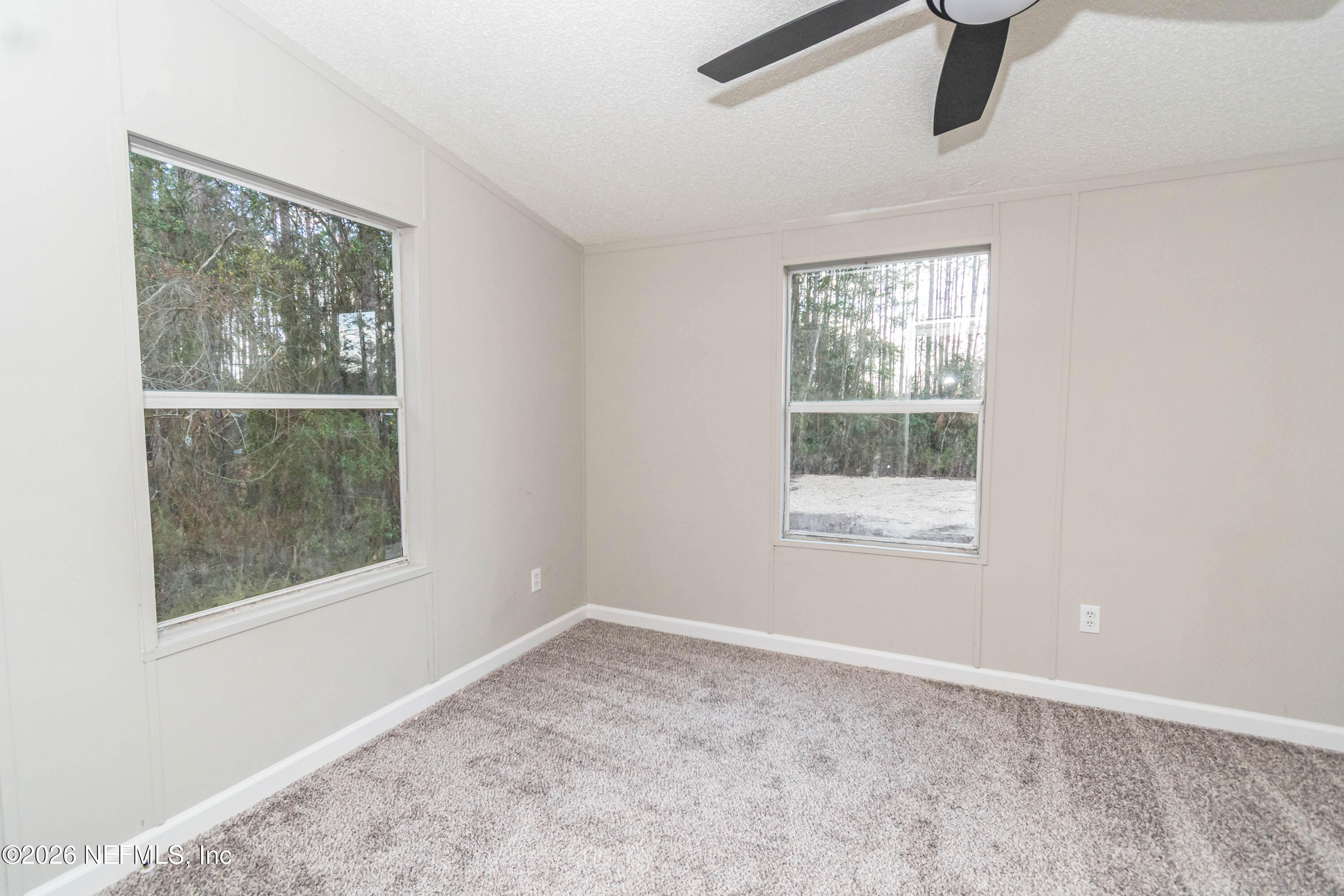 11017 County Road 229 Sanderson, FL 32087 - Photo 22 of 33 an empty room with a window