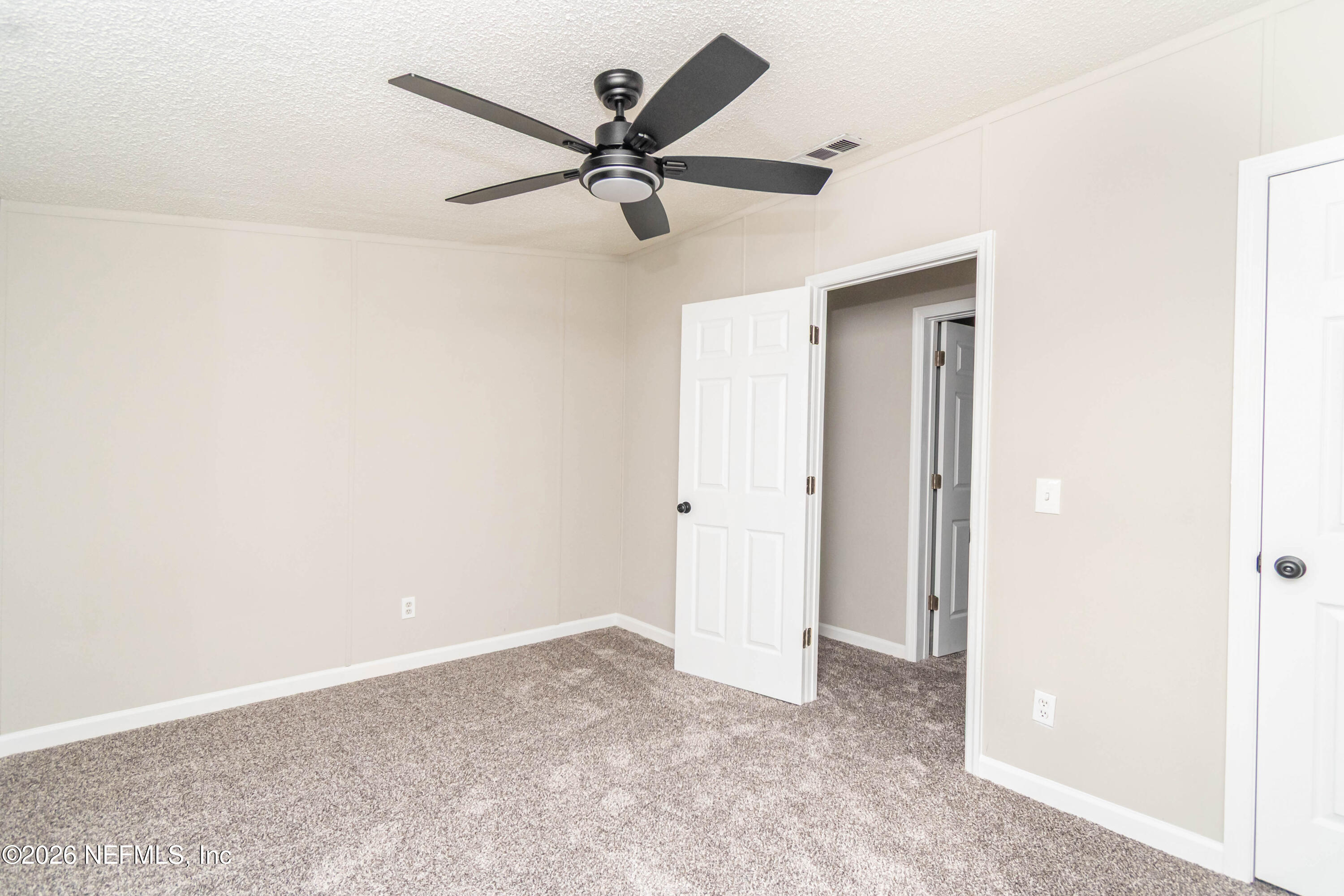 11017 County Road 229 Sanderson, FL 32087 - Photo 23 of 33 a view of a big room with a fan