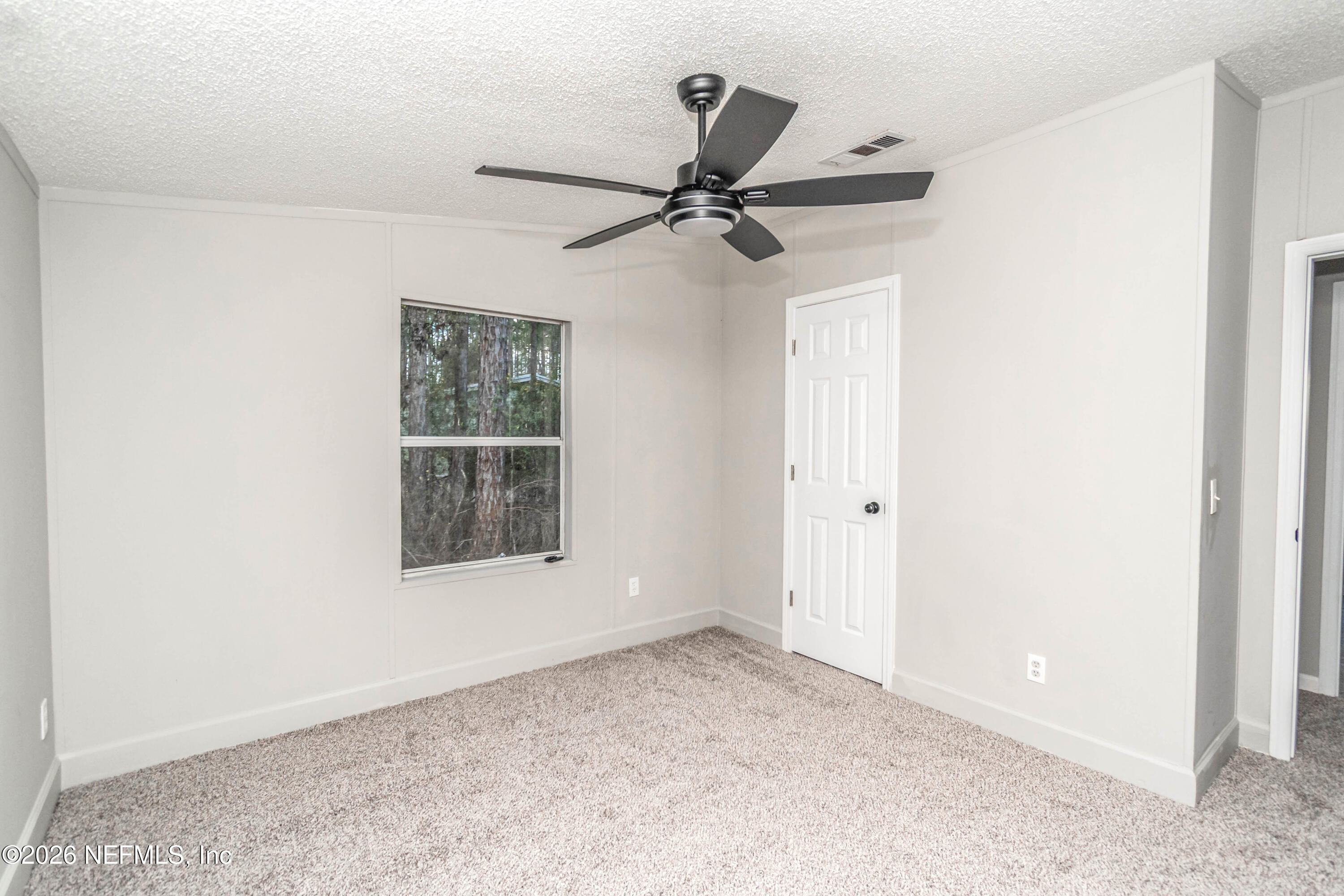 11017 County Road 229 Sanderson, FL 32087 - Photo 27 of 33 a view of an empty room with a window