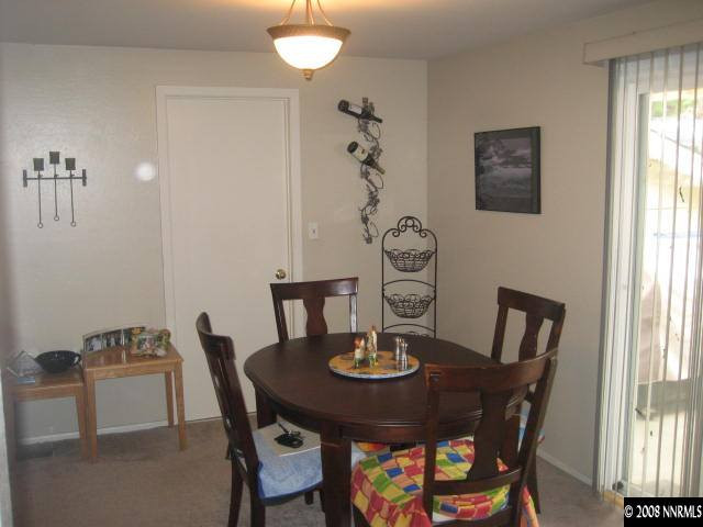 1975 Carlin Street Reno, NV 89503 - Photo 3 of 9 a view of a dining room with furniture and window