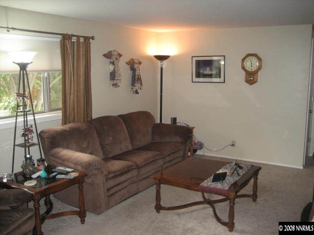 1975 Carlin Street Reno, NV 89503 - Photo 4 of 9 a living room with furniture and a wooden floor
