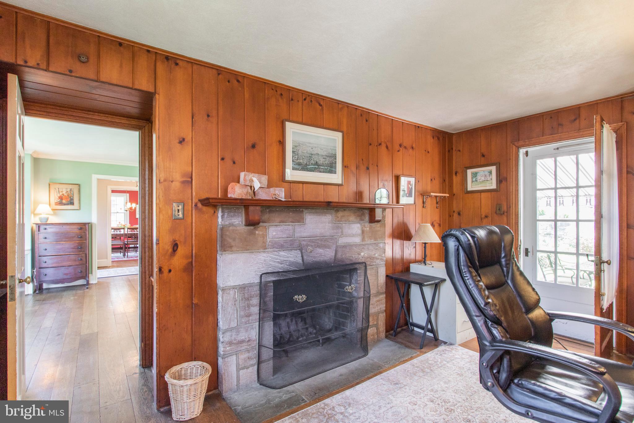 118 Waverly Road Wyncote, PA 19095 - Photo 18 of 87 1st floor study with stone fireplace