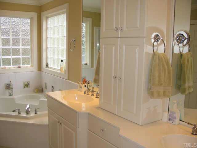 3124 Cranesbill Drive Raleigh, NC 27613 - Photo 8 of 12 Master Bath Has Cultured Marble, Garden Tub & Separate Shower