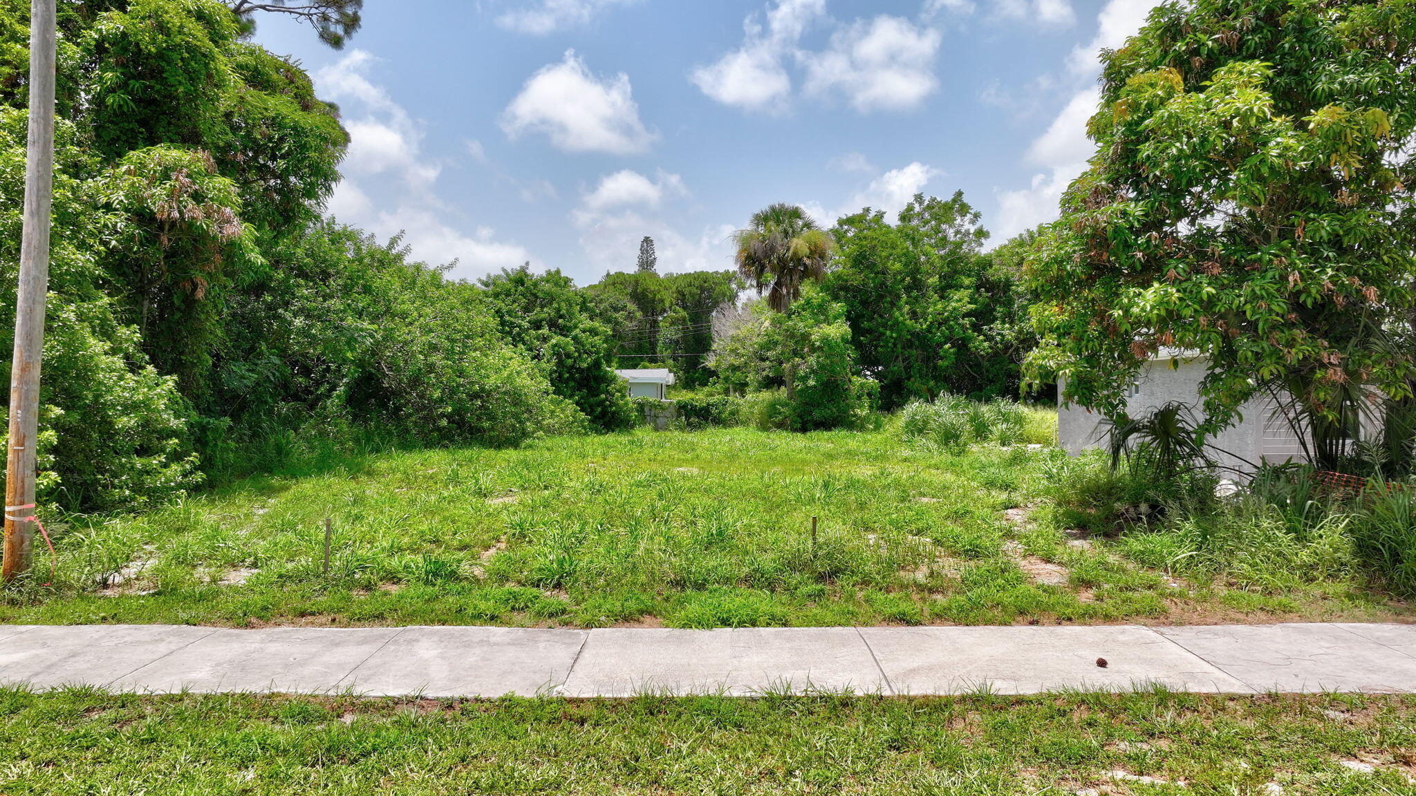 5684 Southeast 45th Avenue Stuart, FL 34997 - Photo 4 of 27 4-web-or-mls-DJI_20260620045745_0006_D_0