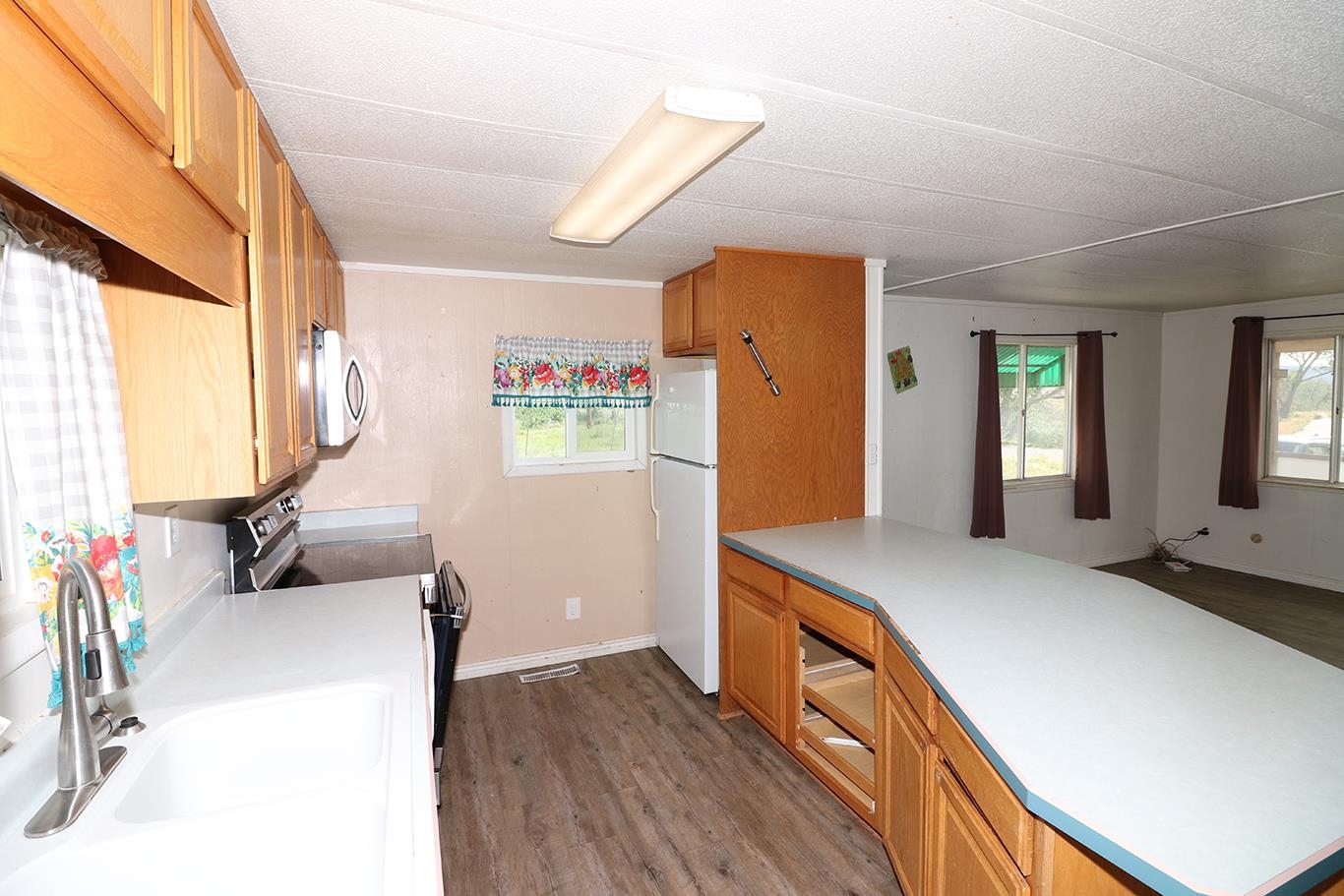 412 35 Road Palisade, CO 81526 - Photo 19 of 39 a kitchen with stainless steel appliances a refrigerator and a stove