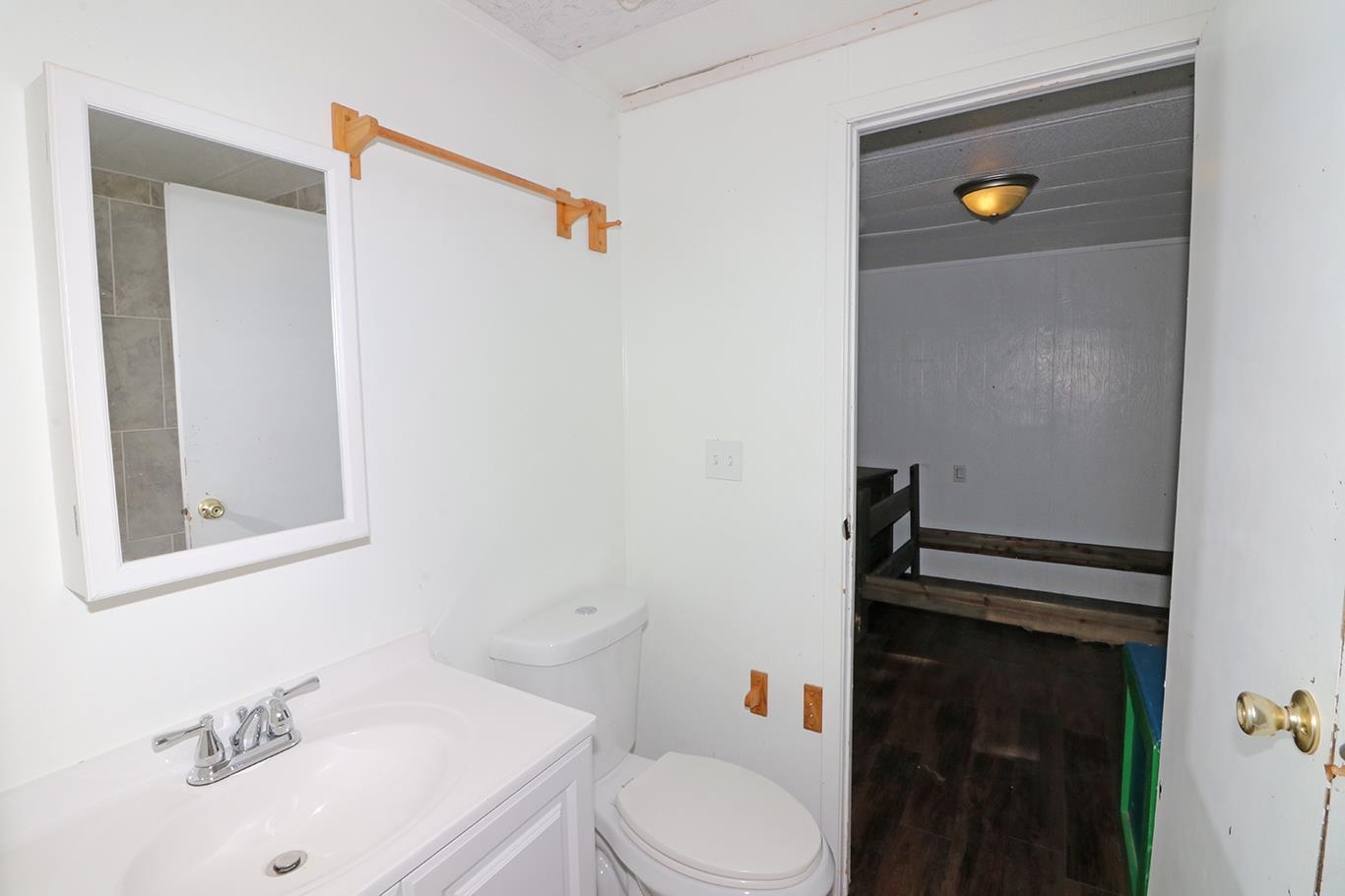 412 35 Road Palisade, CO 81526 - Photo 26 of 39 a bathroom with a sink and toilet