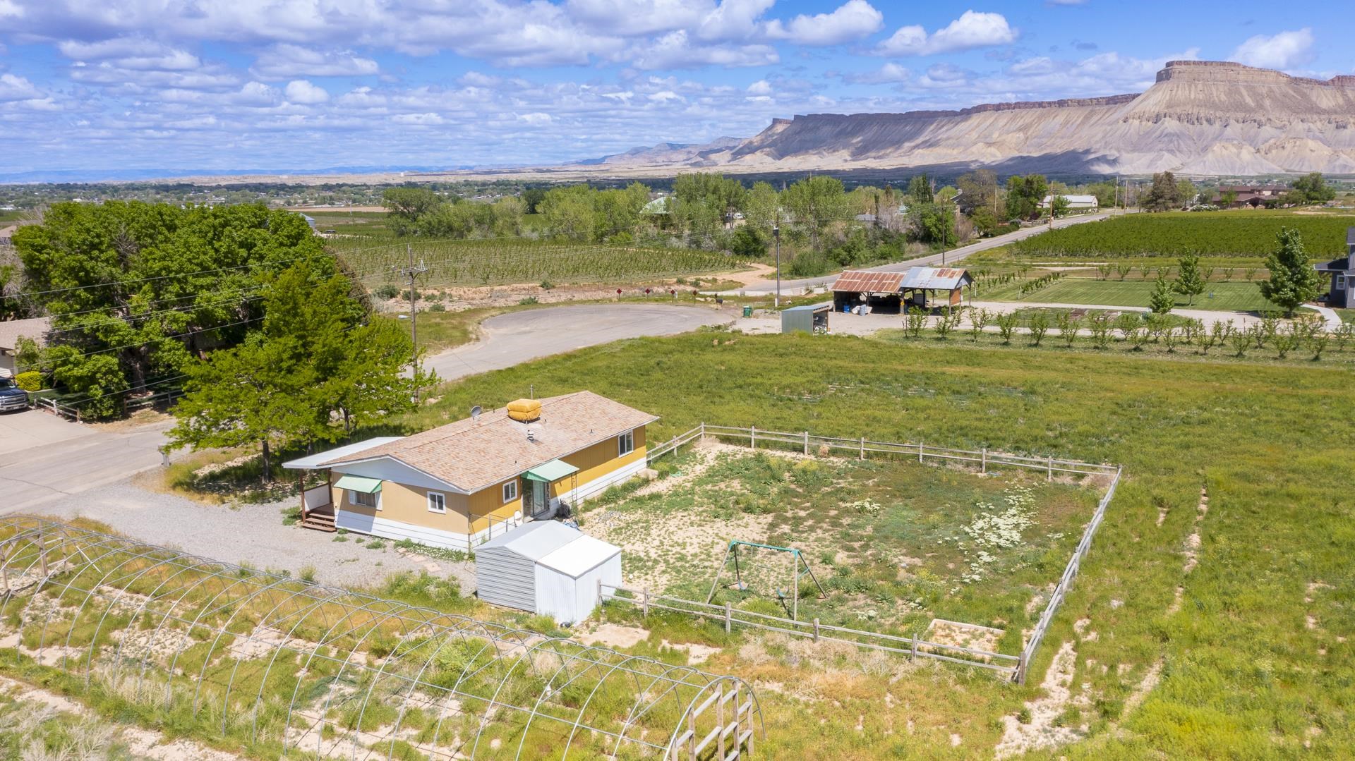 412 35 Road Palisade, CO 81526 - Photo 37 of 39 a view of an outdoor space and a yard