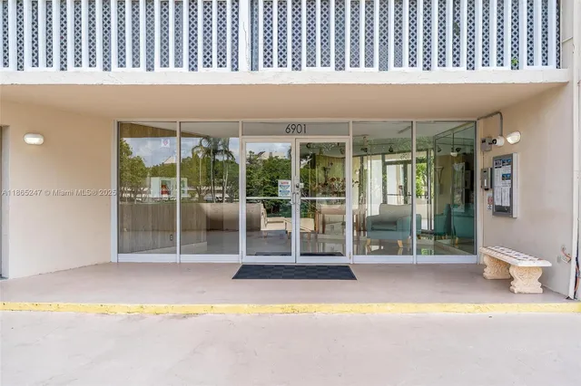 a kitchen with stainless steel appliances granite countertop a stove microwave and cabinets