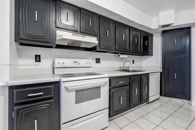 a view of a park with large trees