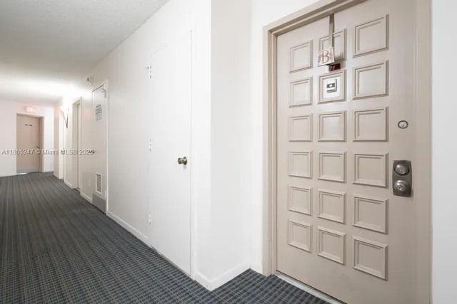 a view of bedroom with wooden floor