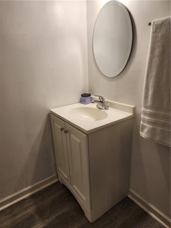 200 Cave Spring Street Southwest Rome, GA 30161 - Photo 11 of 16 a bathroom with a sink and a mirror