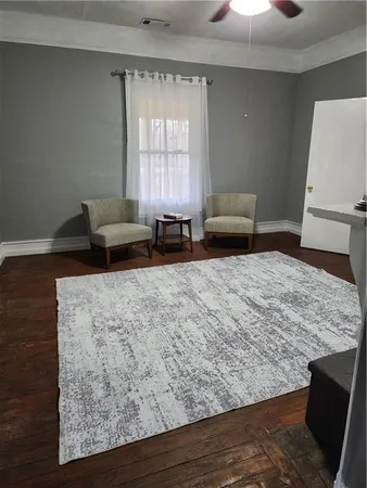 a living room with furniture and a couch