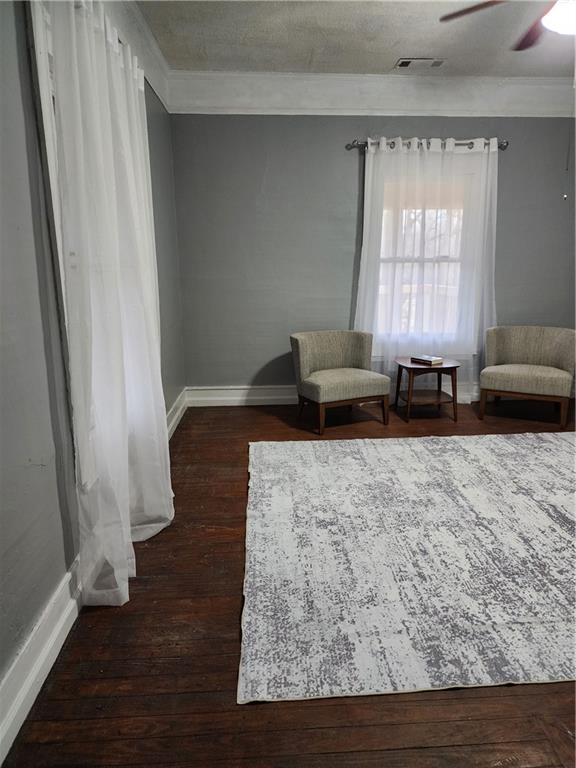 200 Cave Spring Street Southwest Rome, GA 30161 - Photo 4 of 16 a living room with furniture and a window