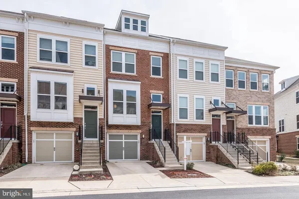 a front view of a building with a street