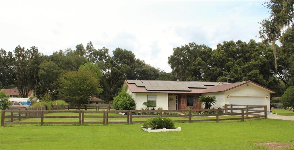 1611 West Socrum Loop Road Lakeland, FL 33810 - Photo 1 of 1 a view of an house with backyard space and balcony