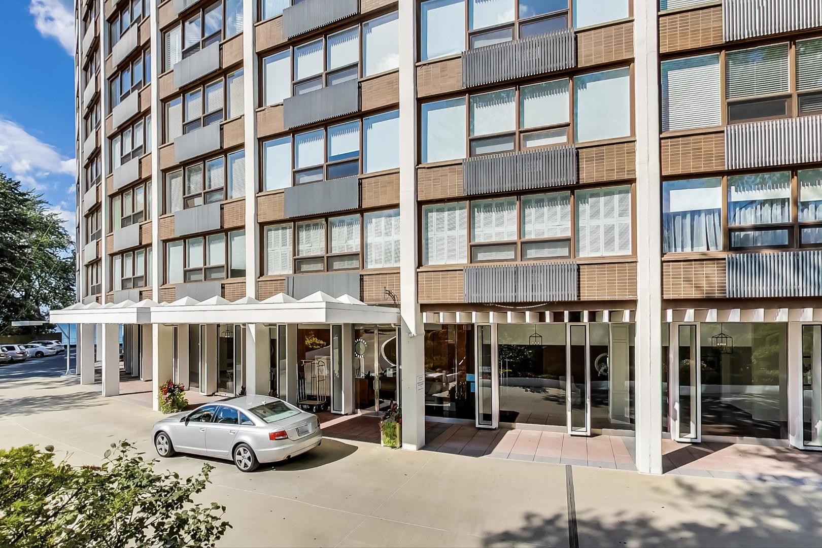 1630 Sheridan Road, Unit 2J Wilmette, IL 60091 - Photo 2 of 50 a car parked in front of brick building