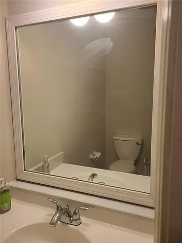 a bathroom with a shower and vanity
