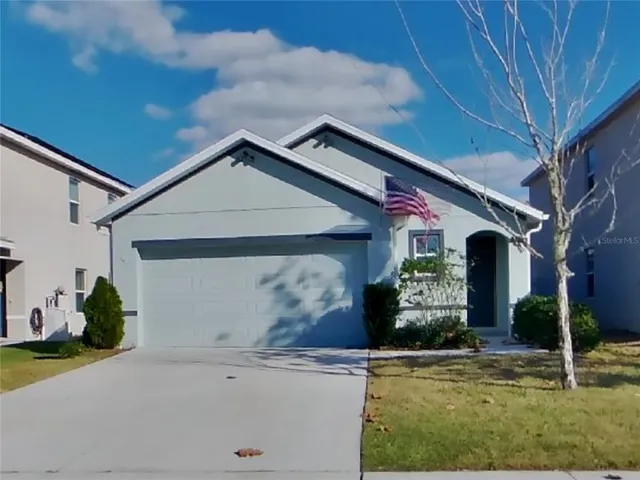 a front view of house with yard
