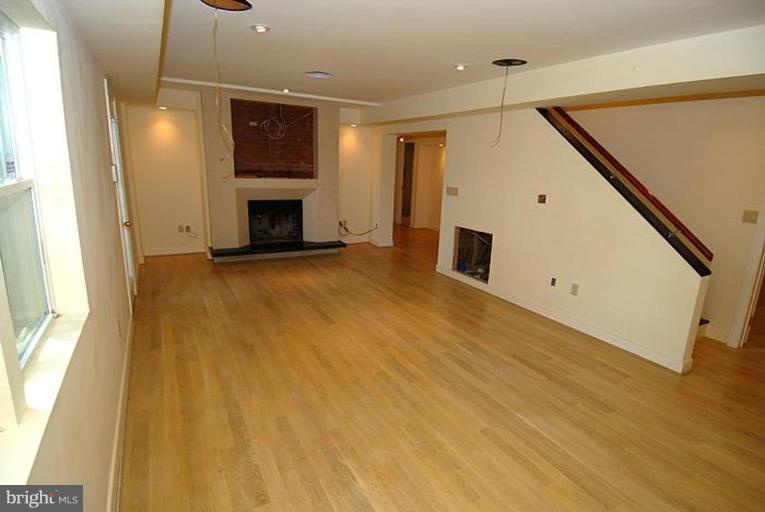 1305 Kurtz Road McLean, VA 22101 - Photo 13 of 20 LL Family Room pre-wired for sound w/limestone FP