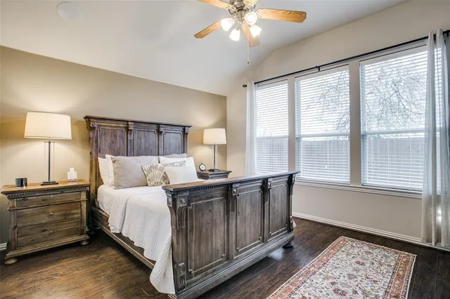 a bathroom with a tub and a view of bathroom