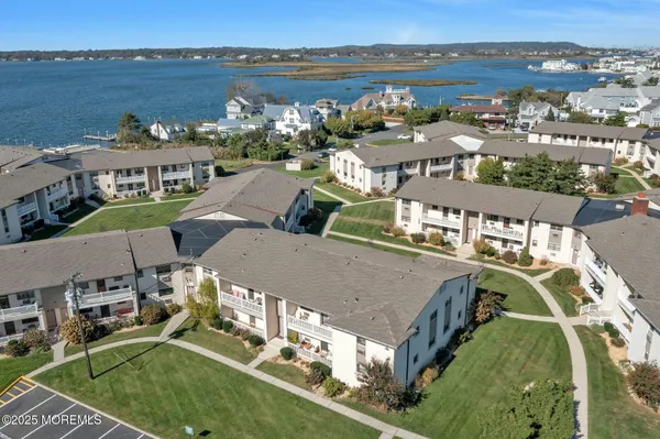 an aerial view of a house with outdoor space