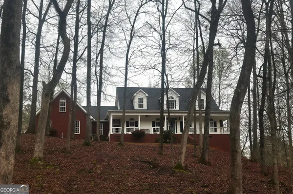 front view of a house with a trees