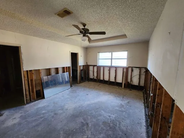 a view of a livingroom with a staircase