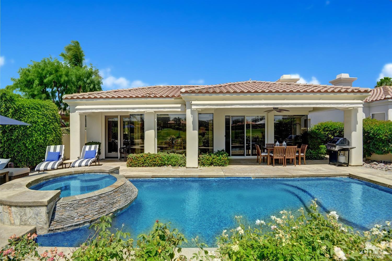 79675 Cetrino La Quinta, CA 92253 - Photo 1 of 34 front view of a house with swimming pool and porch