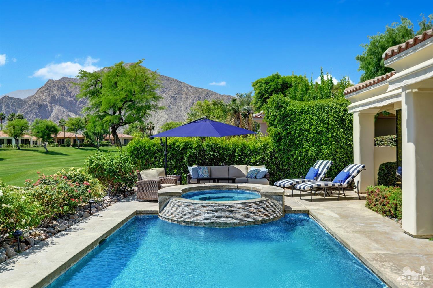 79675 Cetrino La Quinta, CA 92253 - Photo 2 of 34 a view of a house with backyard sitting area and garden