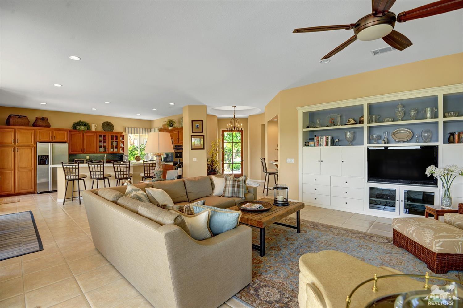 79675 Cetrino La Quinta, CA 92253 - Photo 12 of 34 a living room with furniture fireplace and a flat screen tv