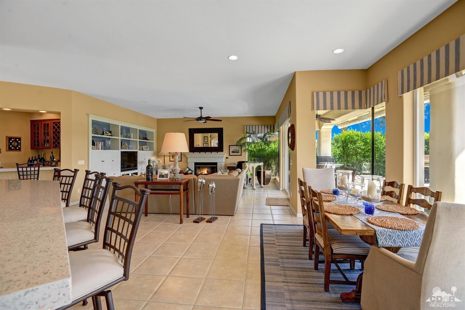 79675 Cetrino La Quinta, CA 92253 - Photo 13 of 34 a view of a dining room with furniture window and outside view