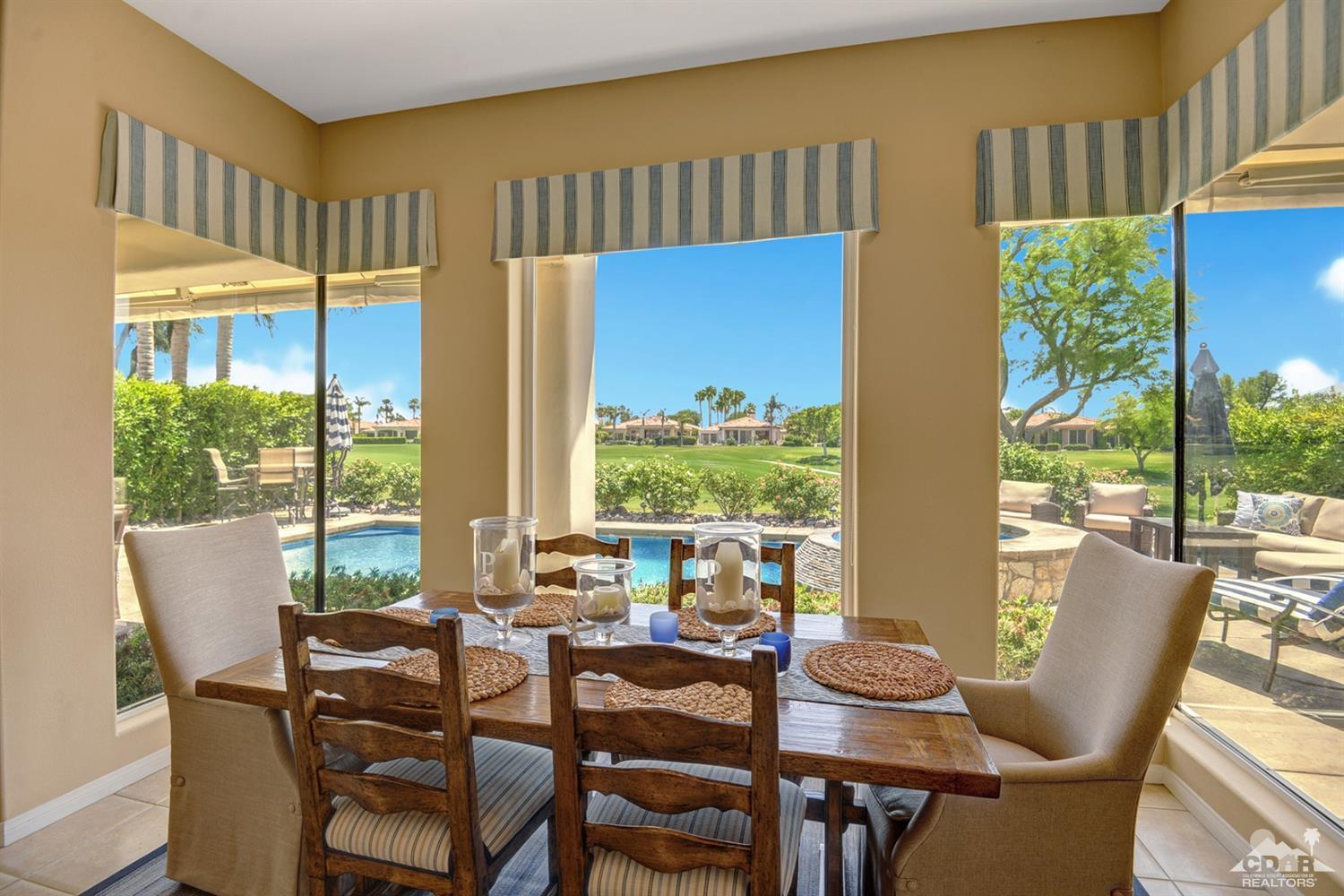 79675 Cetrino La Quinta, CA 92253 - Photo 14 of 34 a view of a dining room with furniture window and outside view