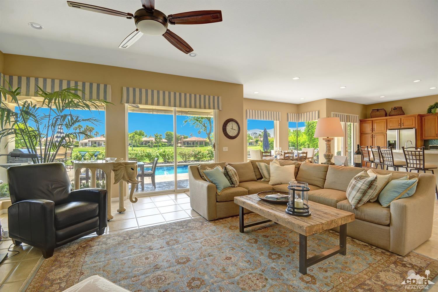 79675 Cetrino La Quinta, CA 92253 - Photo 15 of 34 a living room with furniture and a large window