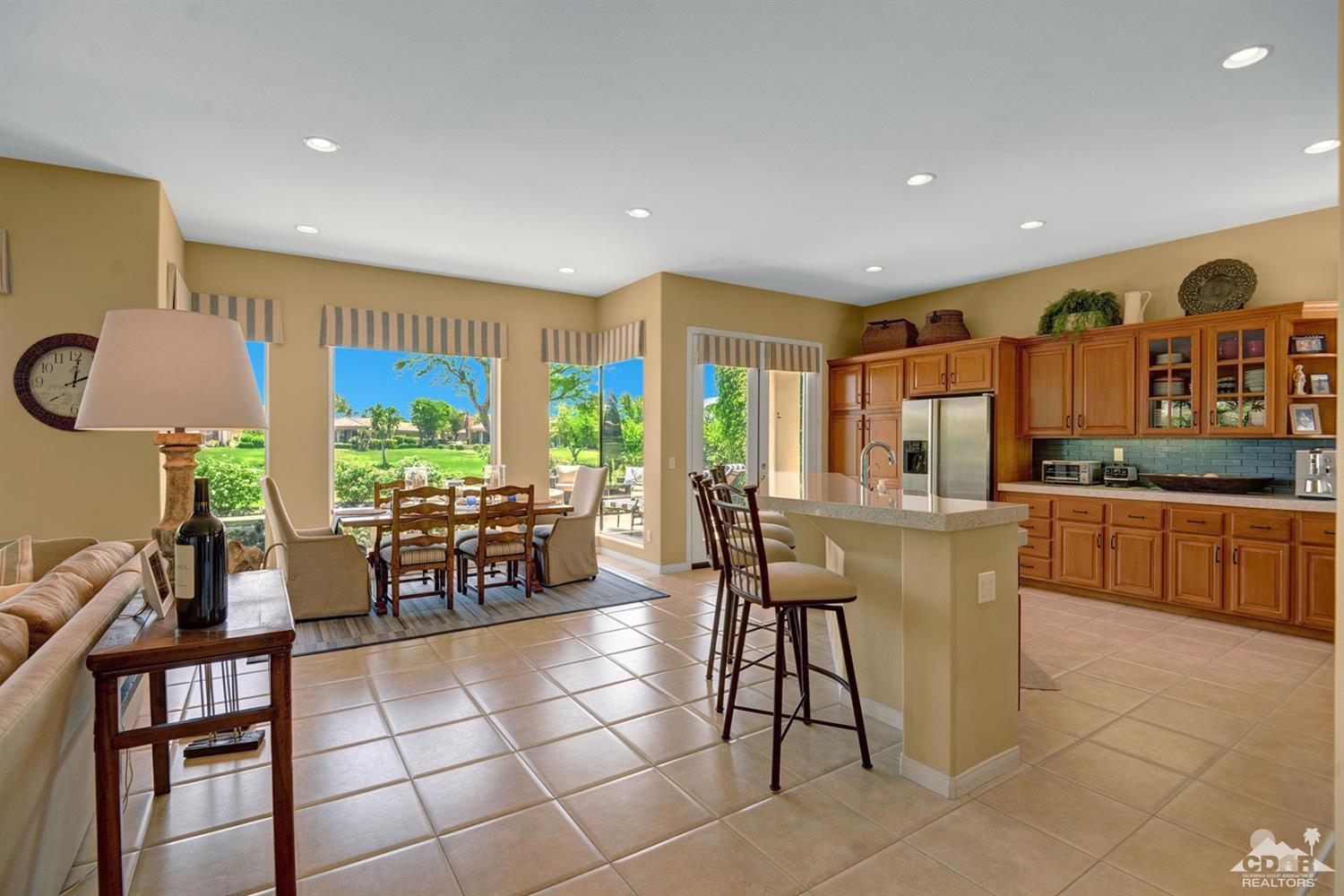79675 Cetrino La Quinta, CA 92253 - Photo 17 of 34 a view of a dining room with furniture