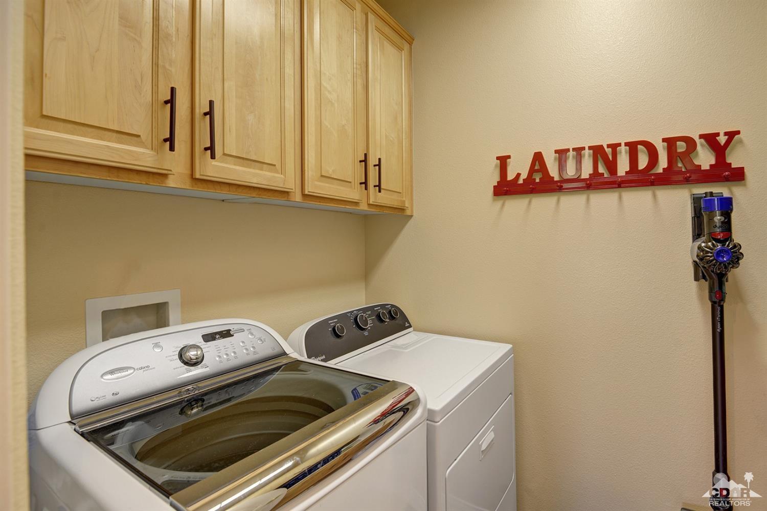 79675 Cetrino La Quinta, CA 92253 - Photo 27 of 34 a utility room with dryer and washer
