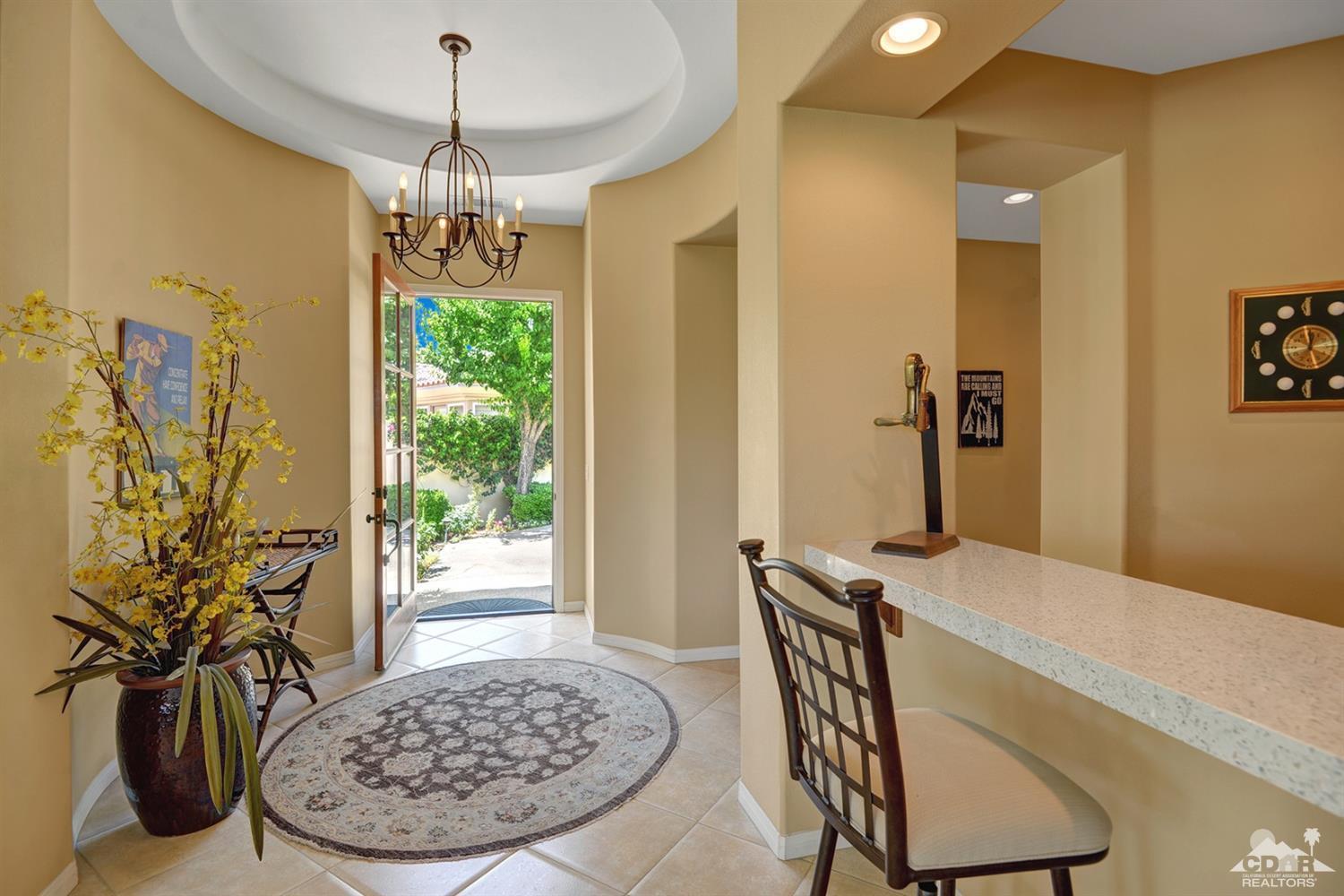 79675 Cetrino La Quinta, CA 92253 - Photo 10 of 34 a view of a dining room with furniture and window