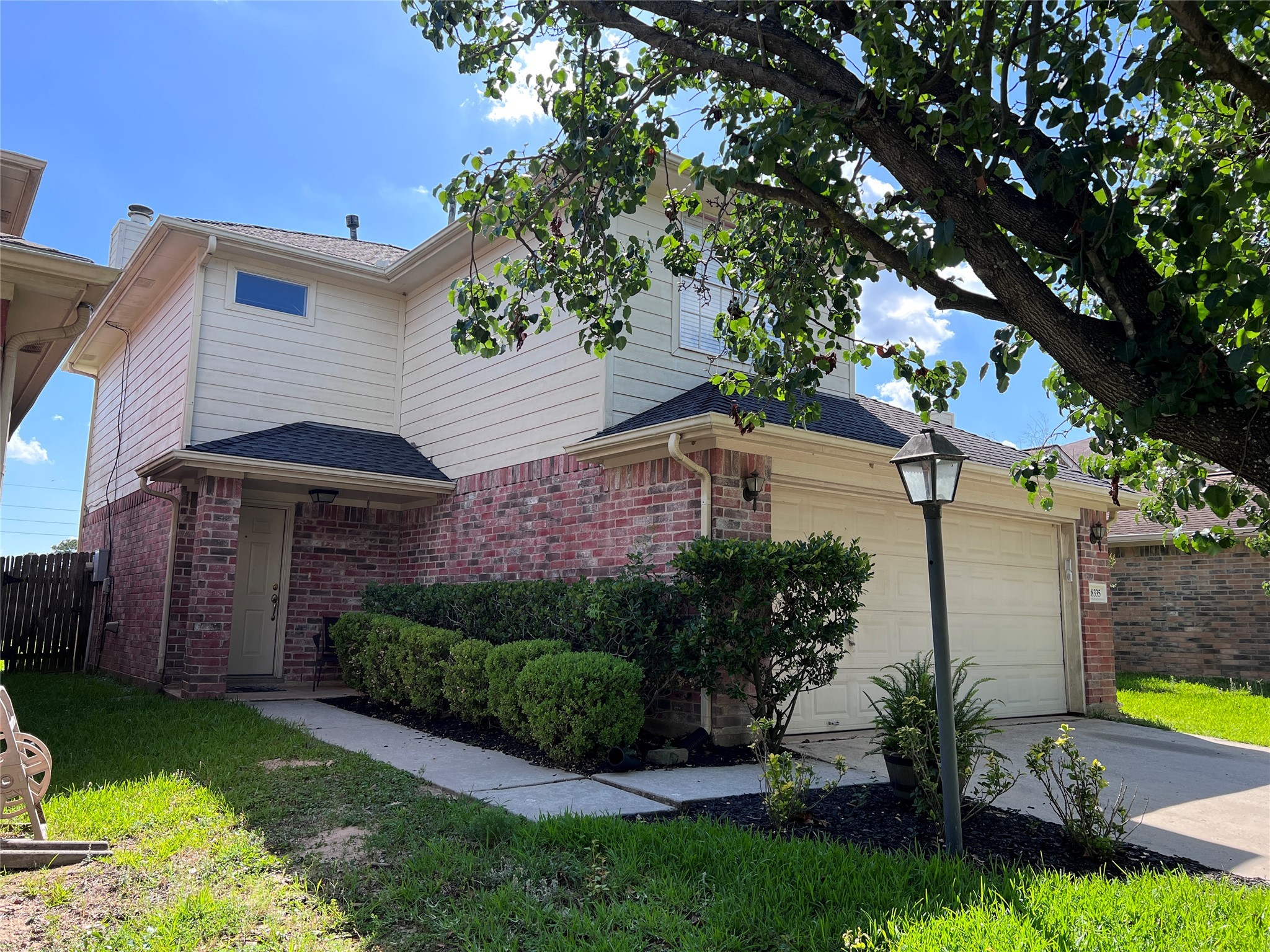 18335 Westlock Street Tomball, TX 77377 - Photo 1 of 38 a front view of house with yard and green space