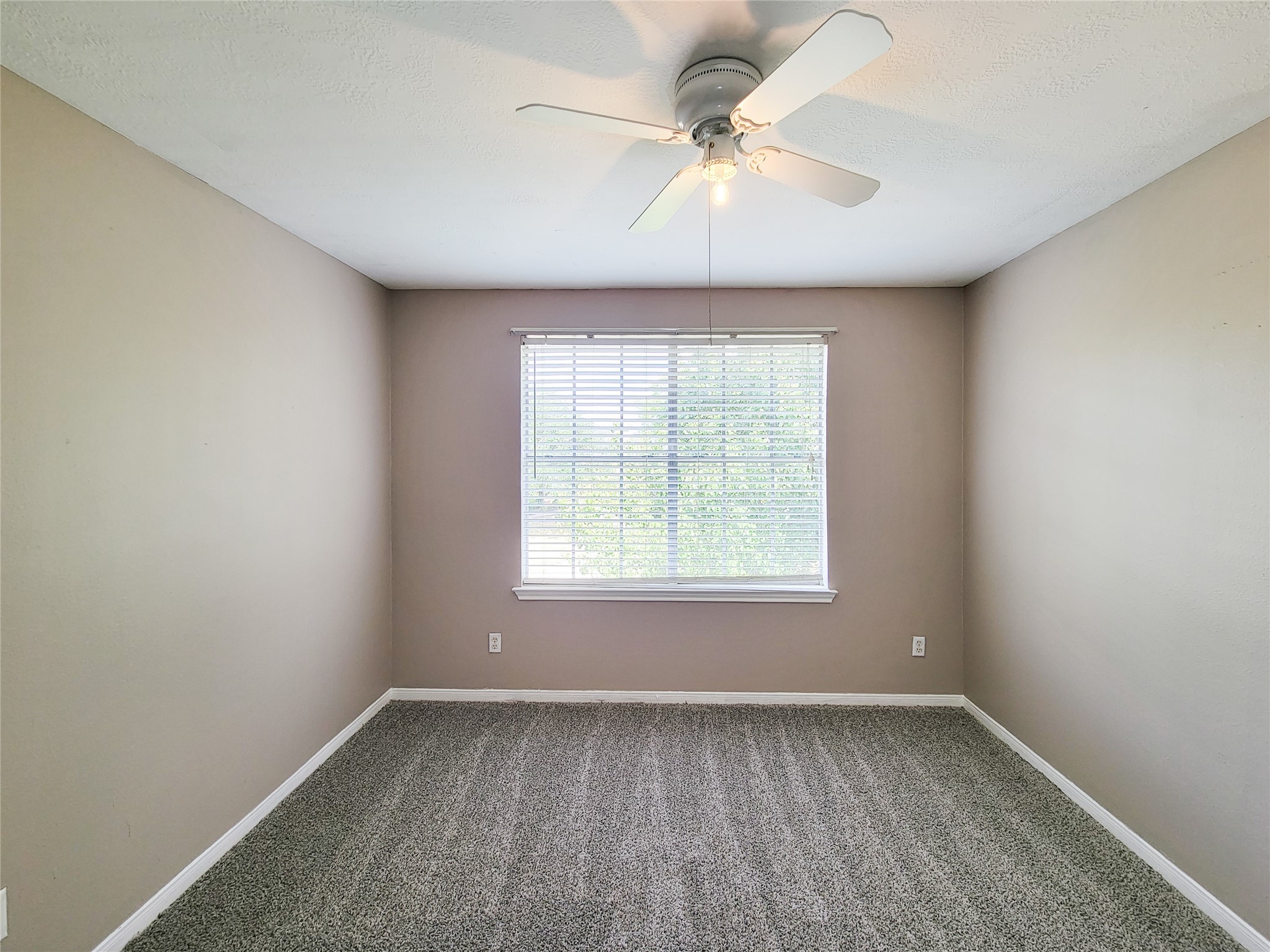 18335 Westlock Street Tomball, TX 77377 - Photo 19 of 38 an empty room with a window