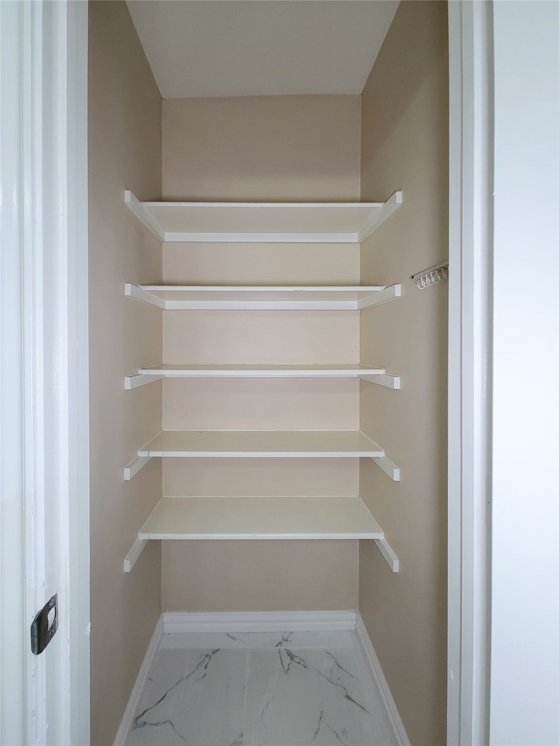 18335 Westlock Street Tomball, TX 77377 - Photo 30 of 38 a view of walk in closet with empty racks