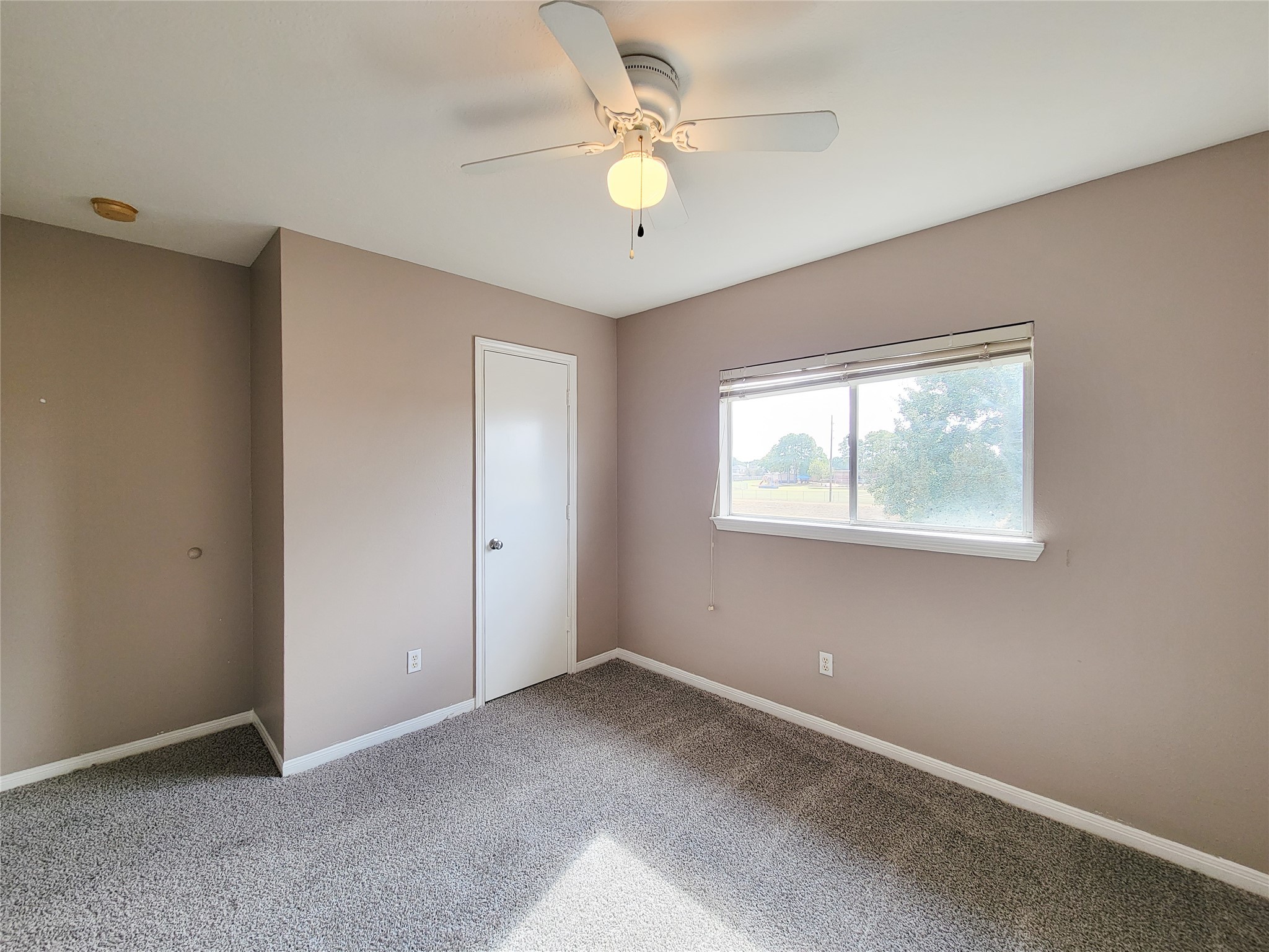 18335 Westlock Street Tomball, TX 77377 - Photo 36 of 38 a view of an empty room with a window
