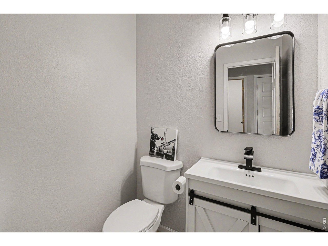 2824 Antelope Road Fort Collins, CO 80525 - Photo 10 of 32 Powder room on main level