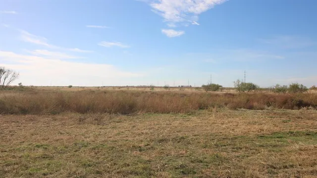 a view of beach and an ocean