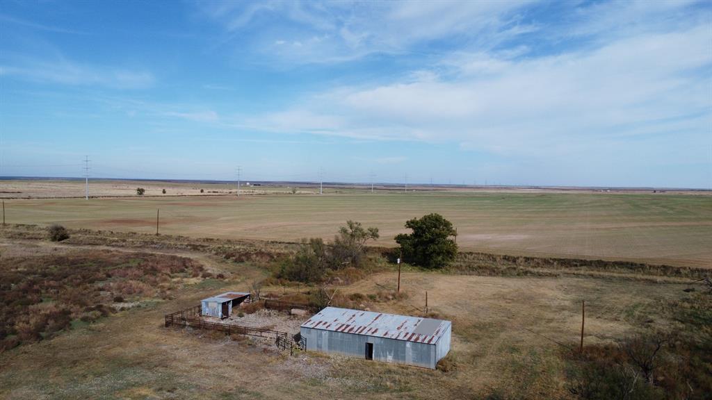 300 County Road 232 Rotan, TX 79546 - Photo 10 of 32 a view of a lake with a yard
