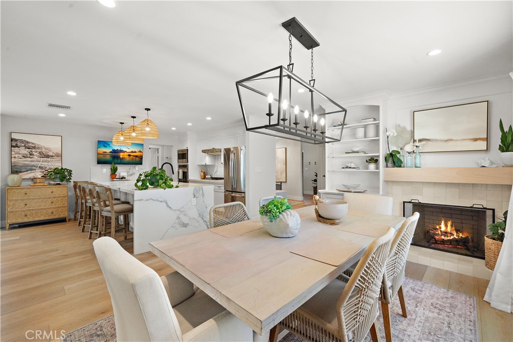 8741 La Roca Avenue Fountain Valley, CA 92708 - Photo 13 of 50 Great room designed dining room, kitchen, and family room