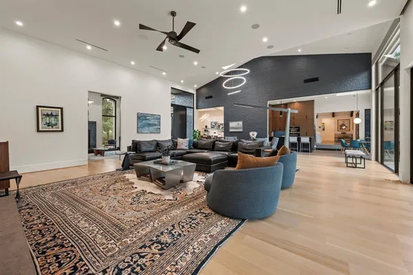 a living room with furniture and a rug