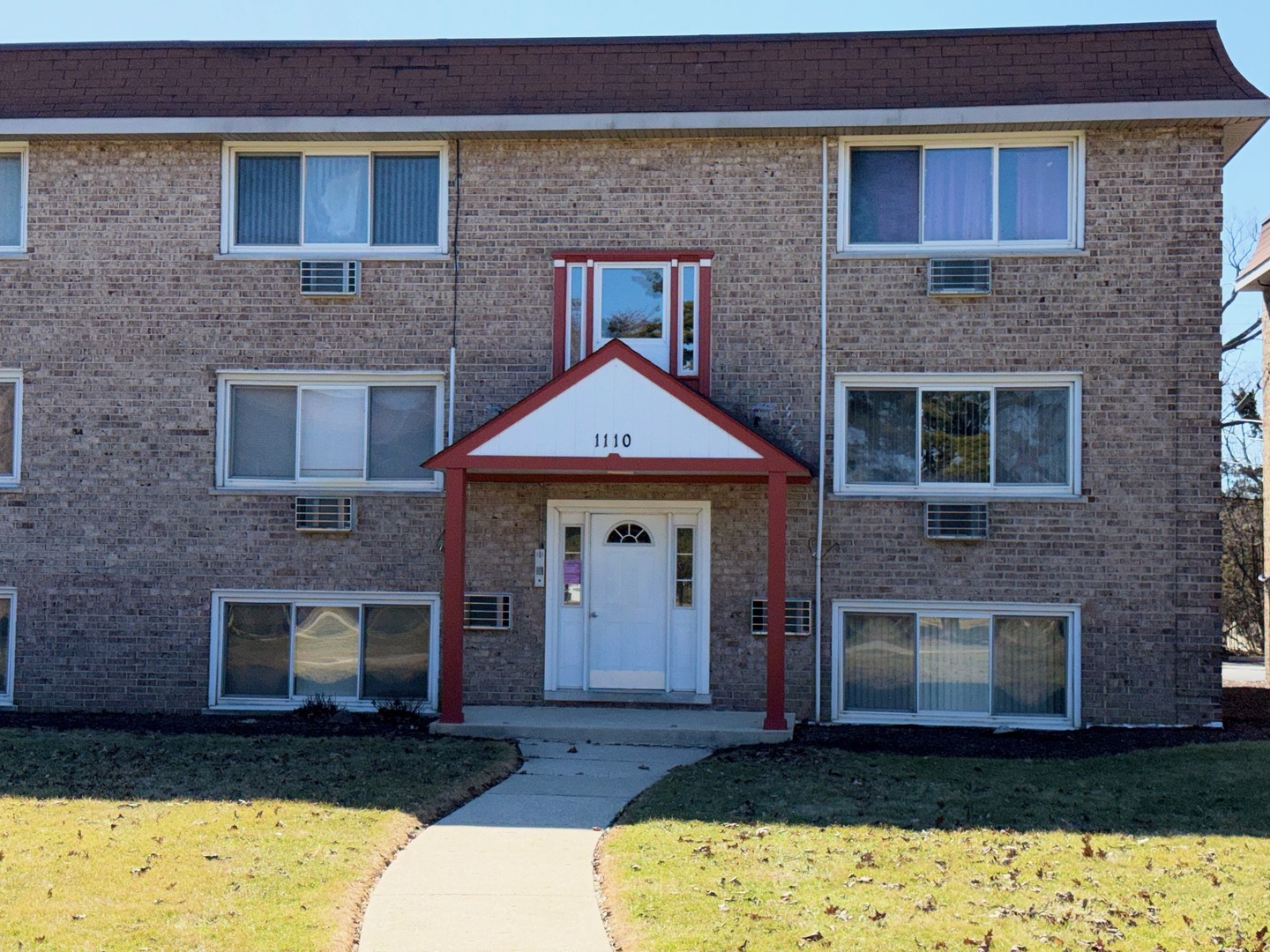 1110 18th Street, Unit GE Broadview, IL 60155 - Photo 1 of 20 a front view of a house with yard